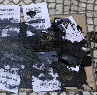 Memorial Plaque For Executed Gay Couple Defaced During Paris Gay Games
