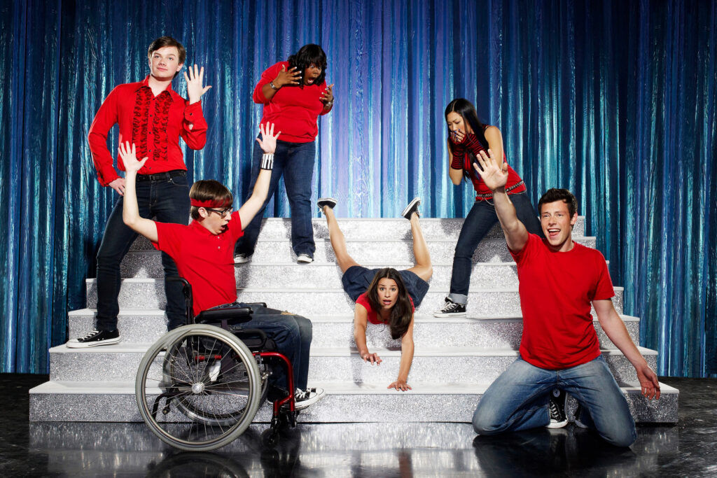 The cast of Glee, including Chris Colfer, Amber Riley, Lea Michele, Jenna Ushkowitz, Cory Monteith and Kevin McHale. Photo by FOX Image Collection via Getty Images