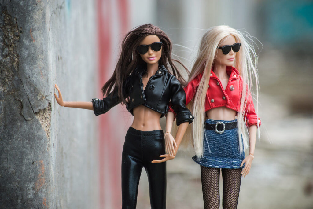 Two Barbie dolls