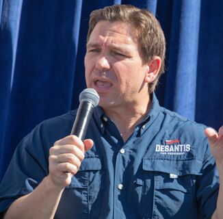 Poll: In this photo, is Ron DeSantis praying or suffering from constipation?