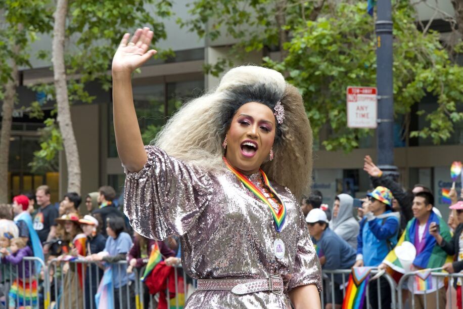 Honey Mahogany participating in the SF Gay Pride Parade up Market St to Civic Center. Theme, Looking Back, Moving Forward.