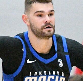 Gay basketball player Isaac Humphries showcases one of his biggest assets