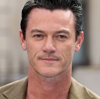 Luke Evans strips down to his briefs because he wants you to buy them