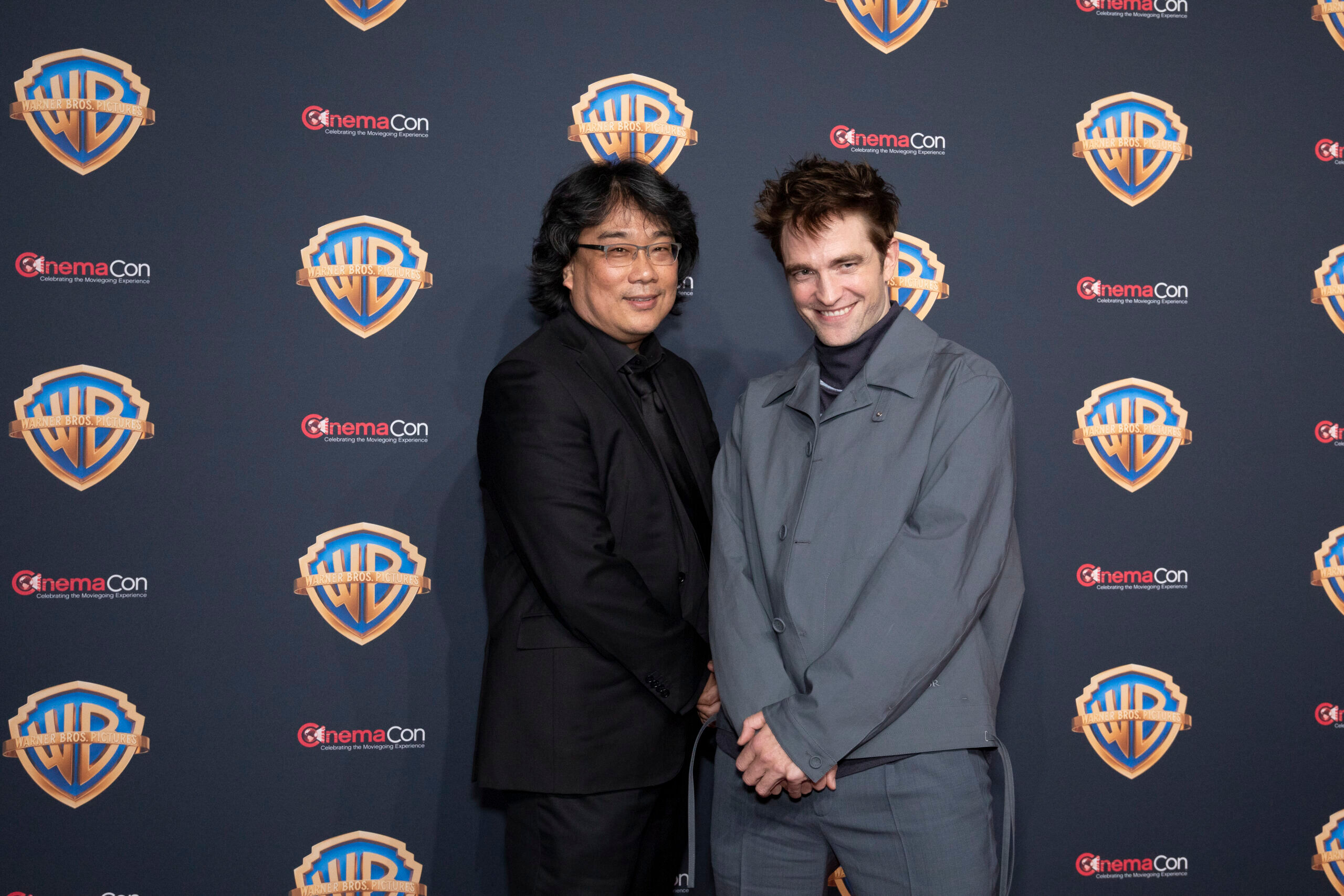 Robert Pattinson and Bong Joon-ho cuddled up on the CinemaCon red carpet and the chemistry is real