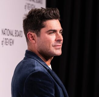 Zac Efron’s daddy-rific look is reminding the gays of something