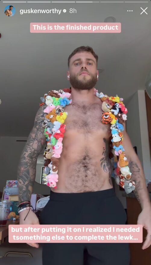 Gus Kenworthy models his soft toy vest